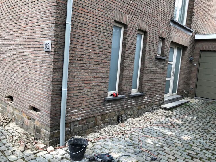 Spouwmuur reinigen spouwvervuiling verwijderen te Bonheiden